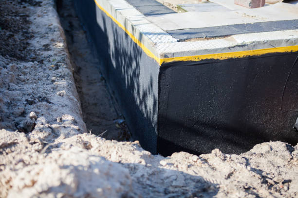 Professional Waterproofing technician working in Leo, IN